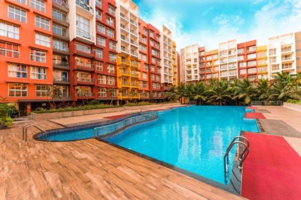 Pool And Garden View Good Stay Premium 2 Bhk Flat 104 다볼림 외부 사진